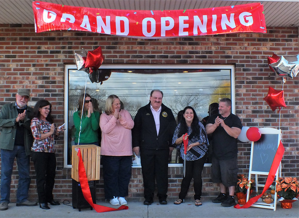A ribbon cutting ceremony was held last Saturday afternoon to mark the Grand Opening of From My Heart to Your Table in Milton. Pictured L-R; BJ Mikkelsen, Sheila Mannese, Sherida Sessa, Gina Hansut, Tom Corcoran and Tina and Neil Fino.